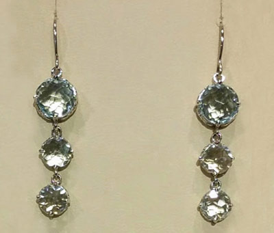 14k White gold earrings with blue topaz