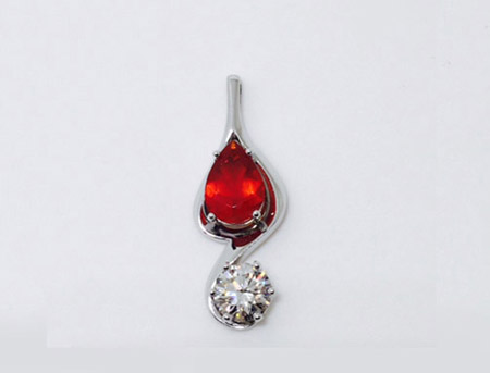 pear shaped fire opal, 1.27 carat Round Brilliant Cut diamond. 14 k white gold mounting
