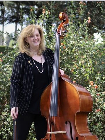 Tracy Wilke with standing Bass