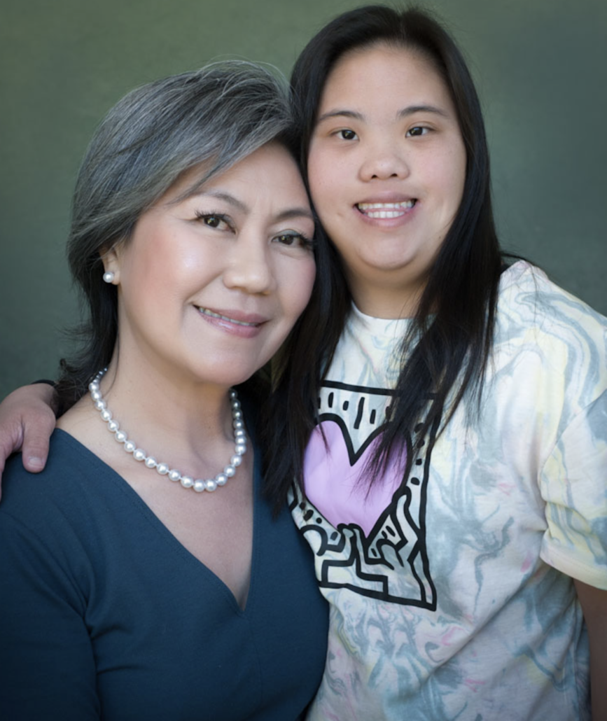 Yanti with daughter, wearing South Sea grey cultured pearls & a pair of round Akoya stud earrings